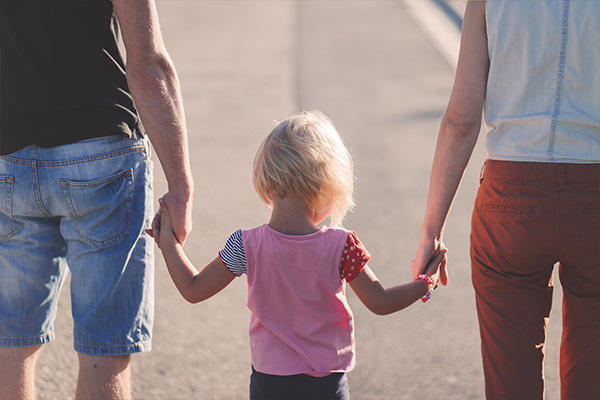 family walking at beach